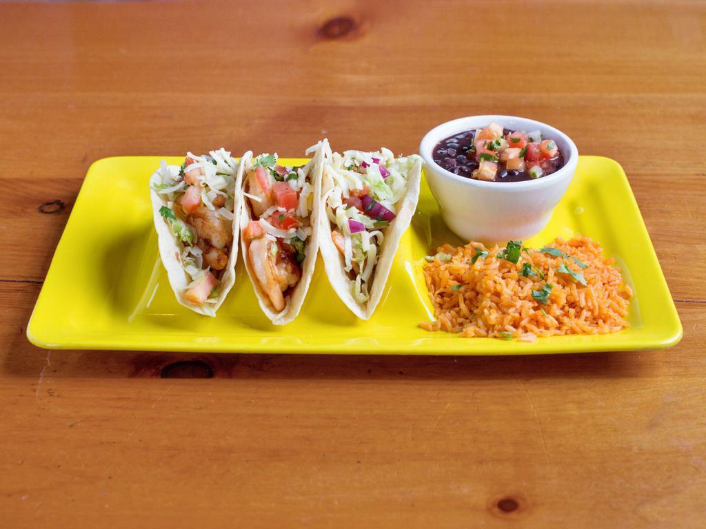 Shrimp Cancun Tacos · 3 flour tortilla tacos topped with shredded cheese served with rice, lettuce, pico de gallo and chipotle cheese sauce.