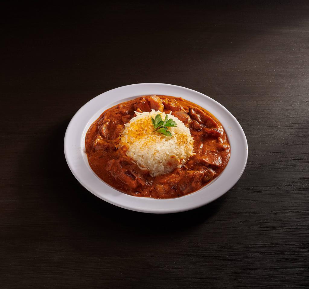 Tendulkar Butter Chicken · Boneless chicken cooked with tomato, cream, and special spices.