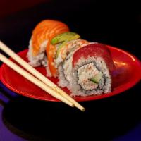 Rainbow Roll · Raw. Crab salad, cucumber inside, tuna, salmon, shrimp and avocado on top.