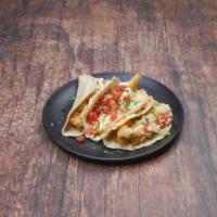 Fried Fish Taco · 3 Hand battered swai, shredded lettuce, fresh pico de gallo, crema, Sriracha aioli and Cotĳa...