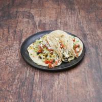 Veggies Taco · 3 tacos with Julienned squash, corn, black beans, roasted red peppers, shredded lettuce, fre...
