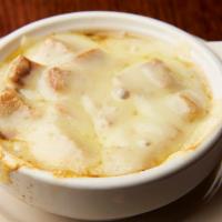 French Onion Pale Ale Soup · Caramelized onions, pale ale beef broth, garlic croutons and Swiss cheese.