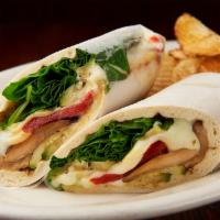 Veggie Wrap · Grilled eggplant, zucchini, yellow squash, roasted red peppers, mozzarella, lettuce, pesto m...