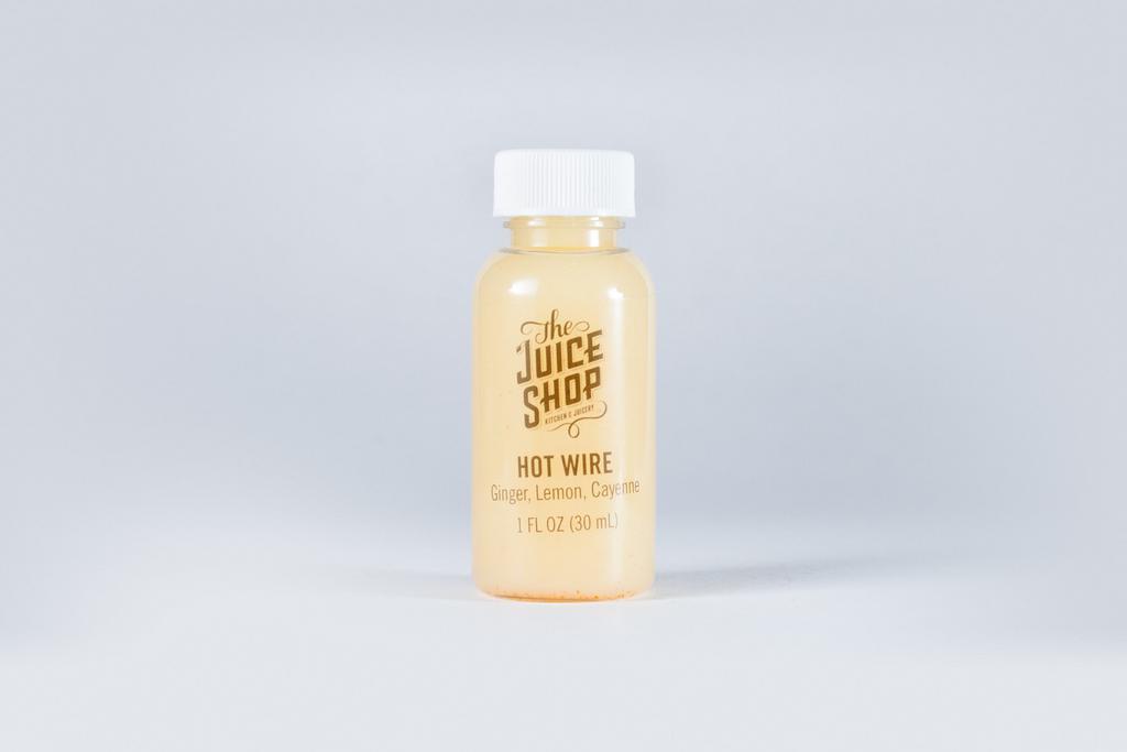 Hot Wire · Ginger, cayenne, lemon. Boosts wellness, improves circulation and relieves symptoms of cold and flu.