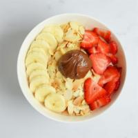 Nutella · Almond Milk, Bananas, Acai, Nutella, Peanut Butter. Topped with Toasted Sliced Almonds, Bana...