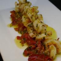 Shrimp Scampi · Lemon, garlic, white wine, butter and roasted peppers.