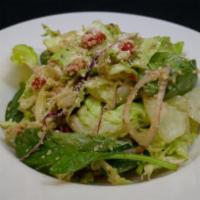 Red Gravy Salad · Mixed greens, shaved red onion, pimento, Parmesan and house vinaigrette.