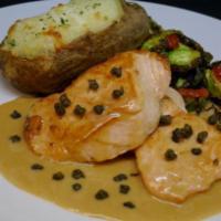 Salmon Picatta · Twice-baked potato, Brussels sprouts, capers, lemon, white wine and touch of cream.