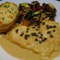 Veal Picatta · Twice-baked potato, Brussels sprouts, capers, lemon, white wine and touch of cream.