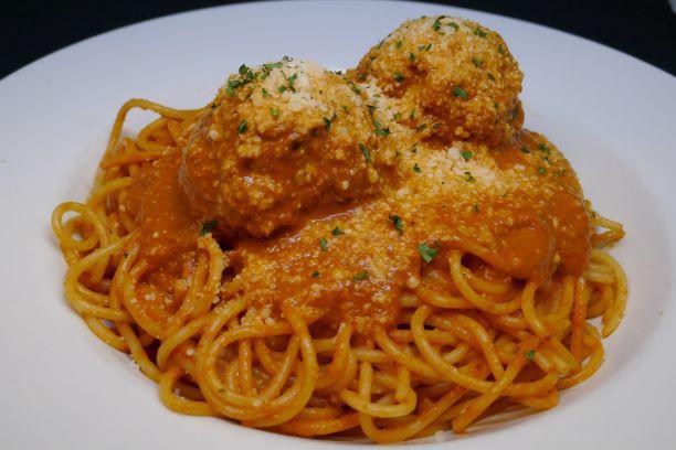 Spaghetti Meatballs · Tomato cream sauce, Grana Padano and parsley.