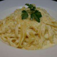 Fettuccine Alfredo · Made to order with cream, butter and grated Parmesan. Add chicken or shrimp for an additiona...