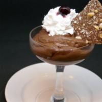Nutella Mousse · Topped with whipped cream, luxardo cherry and chocolate hazelnut bark.