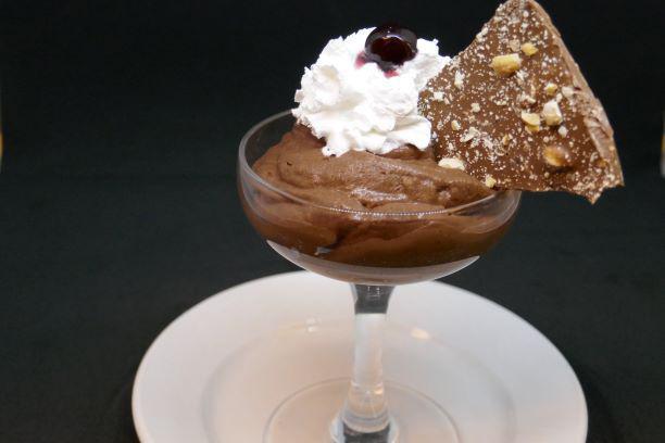 Nutella Mousse · Topped with whipped cream, luxardo cherry and chocolate hazelnut bark.