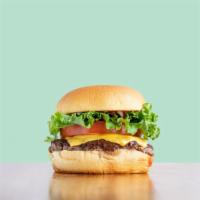 Standard Burger · American cheese, lettuce, tomato, ketchup, and aioli.