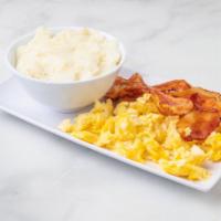 Bacon Breakfast · Served with choice of eggs, toast or biscuit and hash brown or grits.