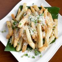 Truffle Fries · Deep-fried fries with truffle oil and Parmesan cheese.