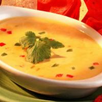 Chile con Queso · Our special blend of cheeses prepared with the freshest vegetables creates the perfect dip.
