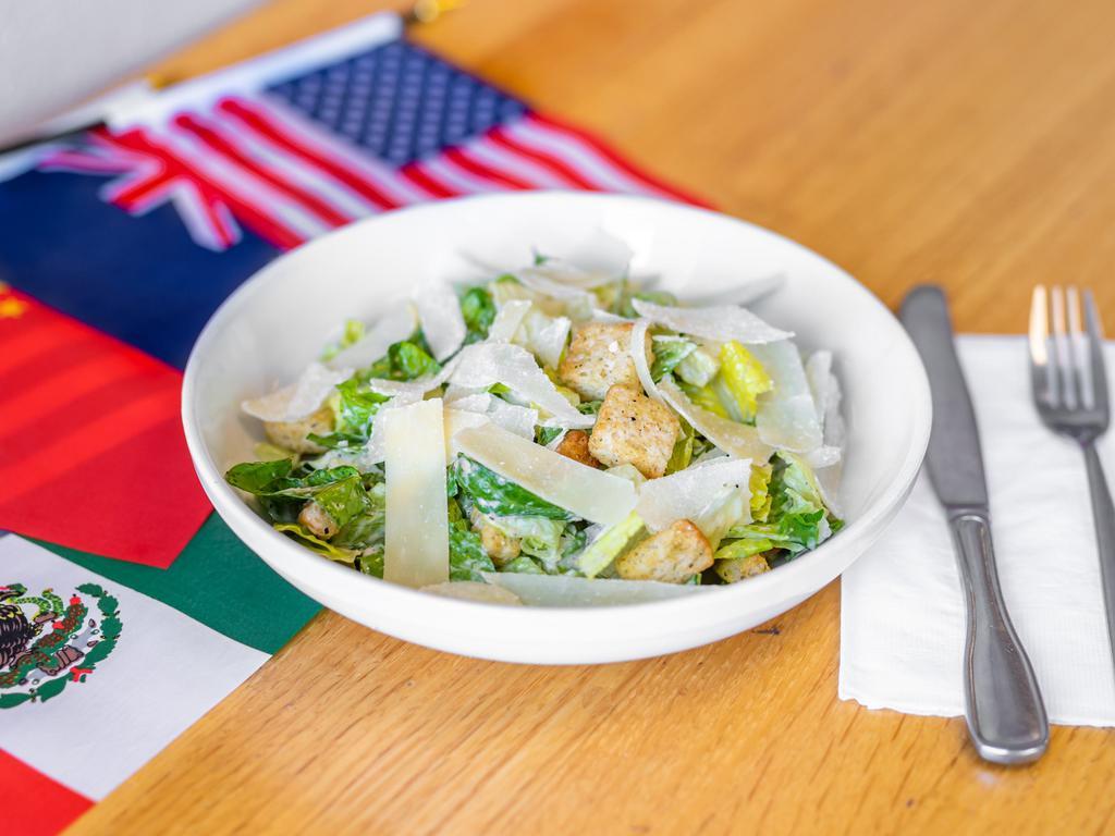 Caesar Salad   ·  Romaine with Parmesan, croutons, Caesar dressing. 