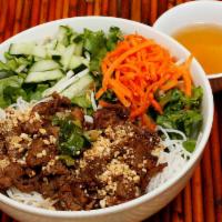 1. Beef with Rice Noodles · Grilled beef served over vermicelli rice noodles and salad mixture 