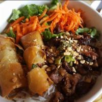1. Pork with Rice Noodles · Grilled pork served over vermicelli rice noodles and salad mixture
Served with Fish Sauce