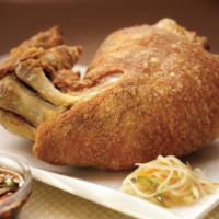 Crispy Pata (Crispy Pork hock) · Premium pork hock simmered in a special marinade and deep fried to perfection.  Served with ...