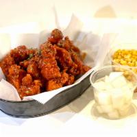 Yang Nyum Chicken Bites (Reg.) · Our crispy Chicken Bites tossed in a secret sweet and spicy sauce 
