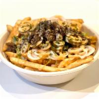 The Volcano* · Loaded French fries with Korean beef bulgogi, freshly-chopped lettuce, onions, and jalapenos...