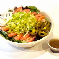 Green Salad · Fresh Spring mix salad with tomatoes, chopped lettuce, jalapenos and onions.
*homemade soy-w...
