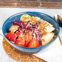 Acai Bowl · Granola, berries, banana, coconut flakes and honey.