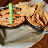Buffalo Chicken Wing Dip · served with house-made tortilla chips
