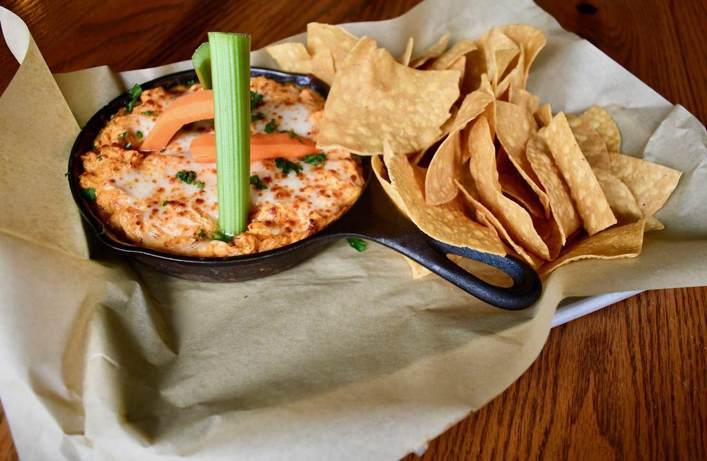 Buffalo Chicken Wing Dip · served with house-made tortilla chips