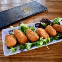 NYC Stuffed Jalapeño Poppers · served with jalapeño ranch dipping sauce