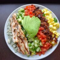 New Yorker Salad · Classic chopped salad featuring grilled chicken, egg, tomato, bacon, cucumber, blue cheese c...