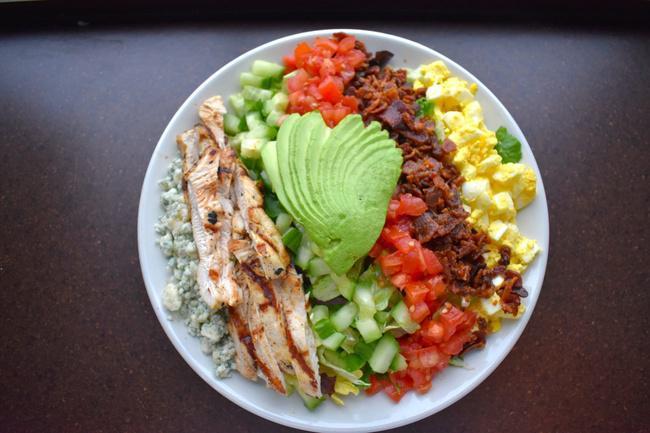 New Yorker Salad · Classic chopped salad featuring grilled chicken, egg, tomato, bacon, cucumber, blue cheese crumbles, avocado