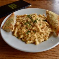 Manhattan Mac · An original NYBP fave!  signature beer cheese sauce and buttery crumb topping. served with g...