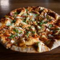 Buffalo Wing Pizza · Tender shredded chicken, mozzarella, bleu cheese, and red & green onion are perfectly melded...