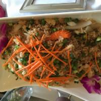 Thai Fresh Fried Rice · Served with egg, carrots, onions, and peas.

