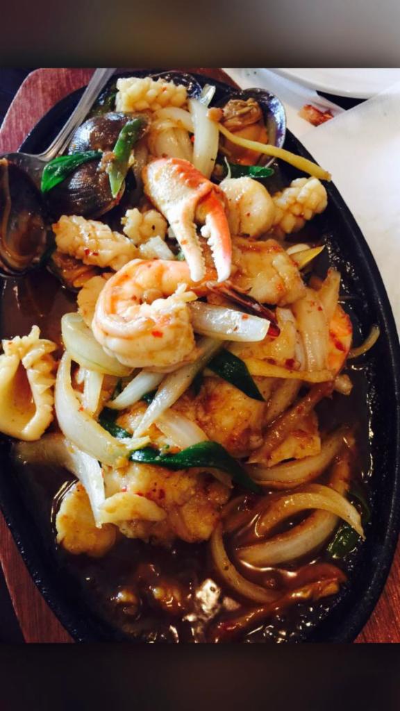 Sizzling Seafood Sensation · Assorted seafood combination stir-fried with onions, ginger and sweet chili paste.