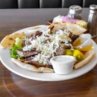 Gyro Salad · Gyro meat served with feta, lettuce, tomatoes, cucumbers, onions, green peppers, Kalamata ol...