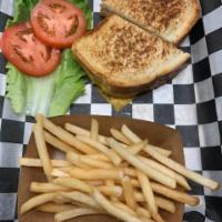 Tuna Melt Sandwich with Fries  · Homemade Tuna Salad / Cheddar Cheese / Sourdough / Lettuce / Tomato