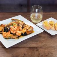 Frutti Di Mare · Marinara Sauce / Olives / Capers / Shrimps / Mussels / Calamari / Basa Fish / with Squid Ink...
