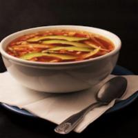 Tortilla Soup · Pieces of grilled chicken breast with tortilla strips in a rice chicken broth, topped with a...