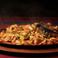 Fajitas for 2 · You select your choice of steak, chicken or shrimp.

A sizzling dish sautéed with green pepp...