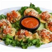 8 Garnachas · Fried tortillas, topped with lettuce, mayonnaise, mustard, ground beef seasoned spices, mixe...
