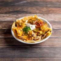 Black Bean and Chicken Nachos · Crispy tortilla chips topped with fajita chicken, black beans, melted cheese and sliced jala...