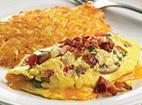 Oh My Omelette · This omelette has got it all. Applewood smoked bacon, sausage, smoked ham, onions, bell pepp...