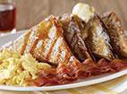 French Toast Platter · Two eggs* and old-fashioned French toast with your choice of applewood smoked bacon or sausa...