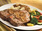 Marie's Meatloaf · Slow-baked with Angus ground beef, onions, green peppers, carrots and special seasonings. To...