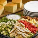 Cobb Salad Platter · A blend of iceberg and romaine topped with grilled chicken breast, gorgonzola cheese, thick ...