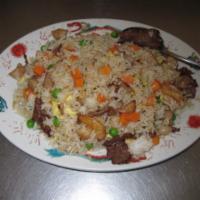 107. House Fried Rice · Chicken, beef, shrimp and pork.